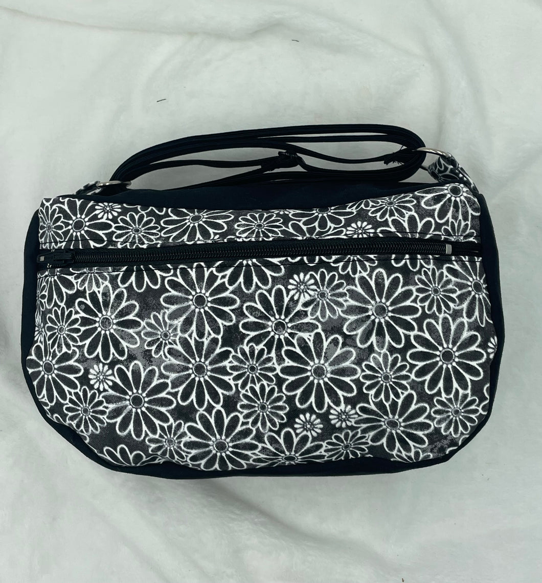 Black Daisy Boho Bitty Bag with outside zipper pocket