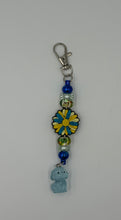 Load image into Gallery viewer, Blue &amp; Yellow Daisy glow in the dark charm
