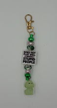 Load image into Gallery viewer, Attitude charm with glow in the dark green dog
